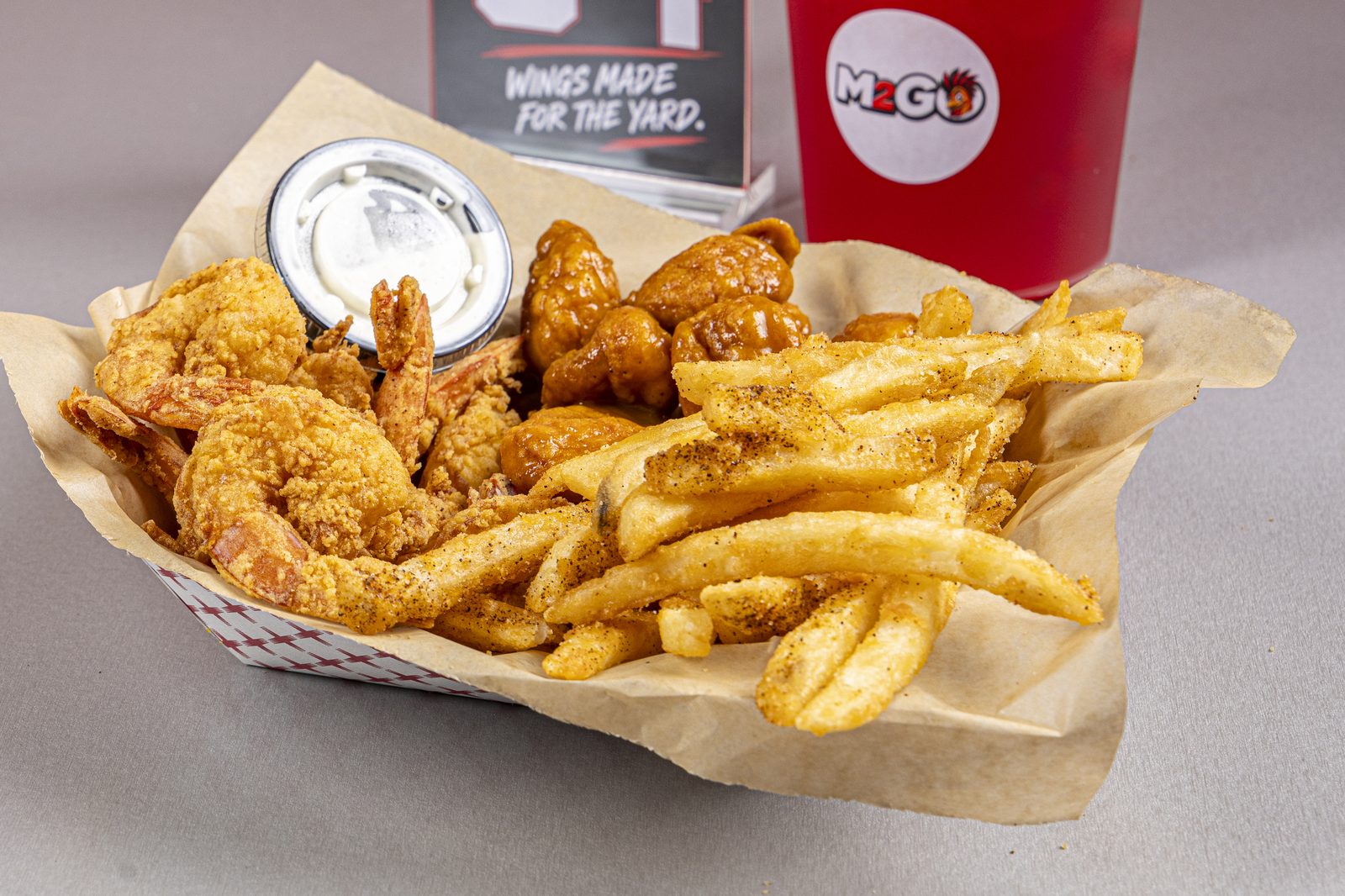 Campus Combo: jumbo shrimp, boneless wings and fries